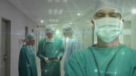 Animation-of-network-of-connections-over-caucasian-surgeons-in-operating-theatre