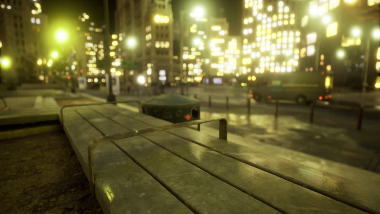 City park at night showcasing urban lights and a reflective wet bench