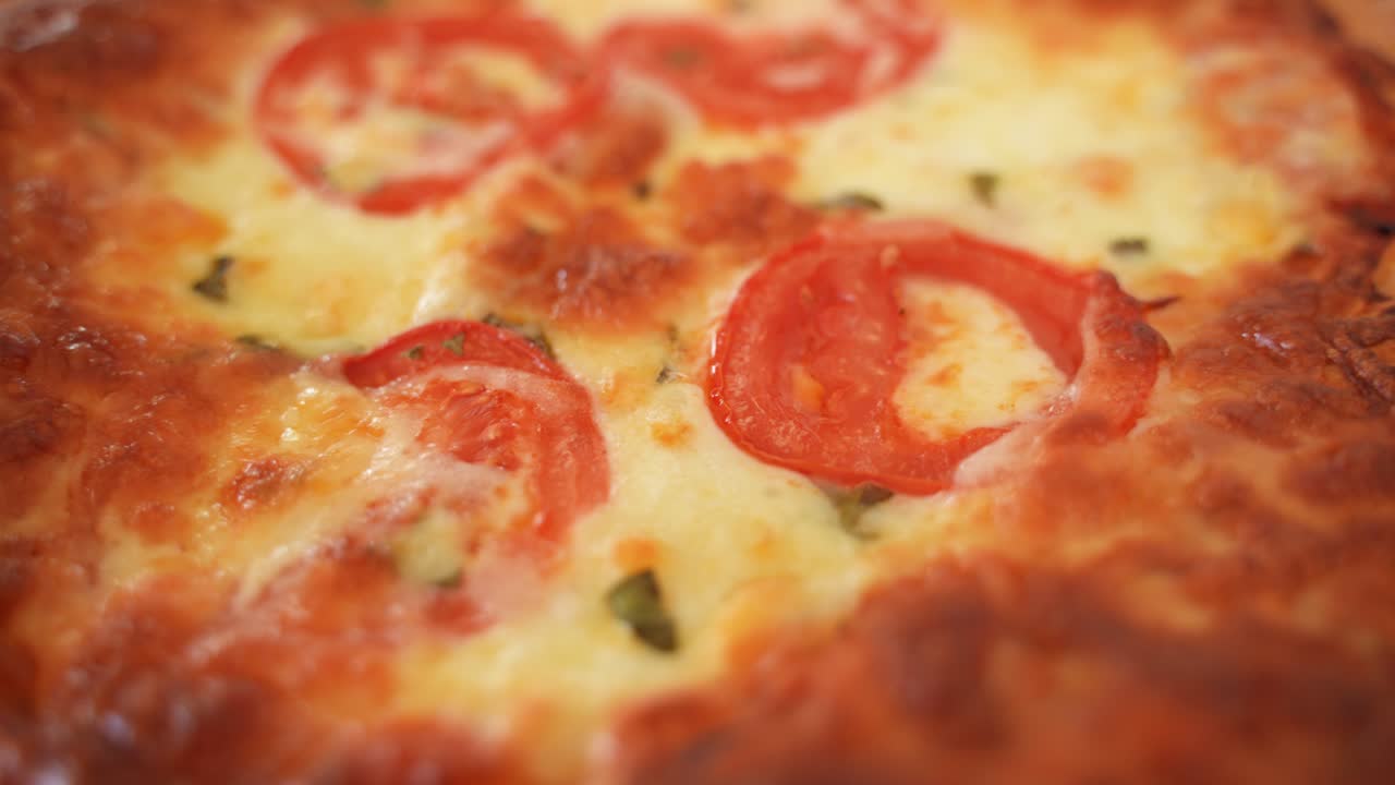 Crusted Golden Pizza with Tomatoes and Cheese, Close Up, Slow Motion Commercial