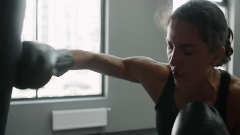 woman boxing training at the gym