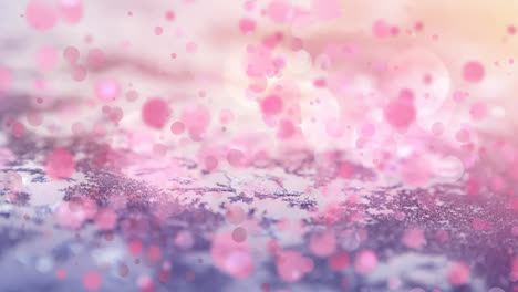 digital composition of pink spots of light moving against snow landscape with trees