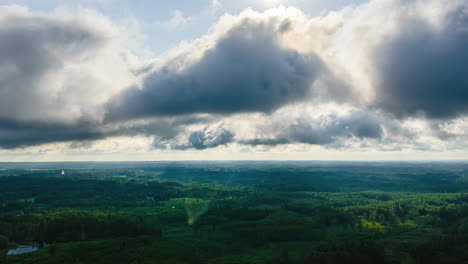 cloudy skyline clouds moving timelapse over lush green countryside park nature forest tree