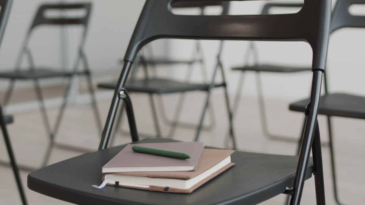 Chair with Notebooks in Conference Room
