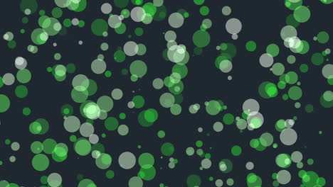 green circles floating and randomly arranged on dark background