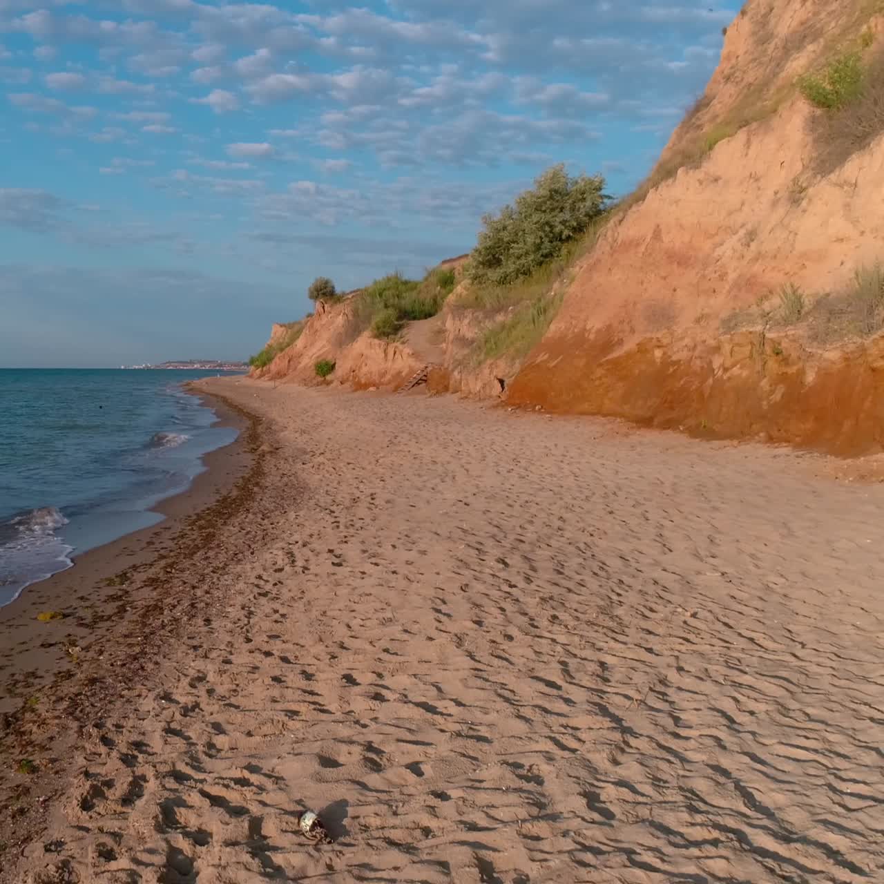 Singer performing on beach. Performance of young man singing on the beach