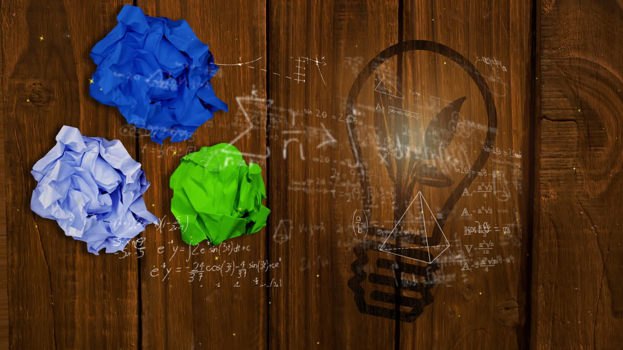 Animation of mathematical equations over lightbulb and crumpled paper