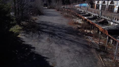 aerial view of empty abandoned ground area outside the minaret at abandoned ghost town consonno