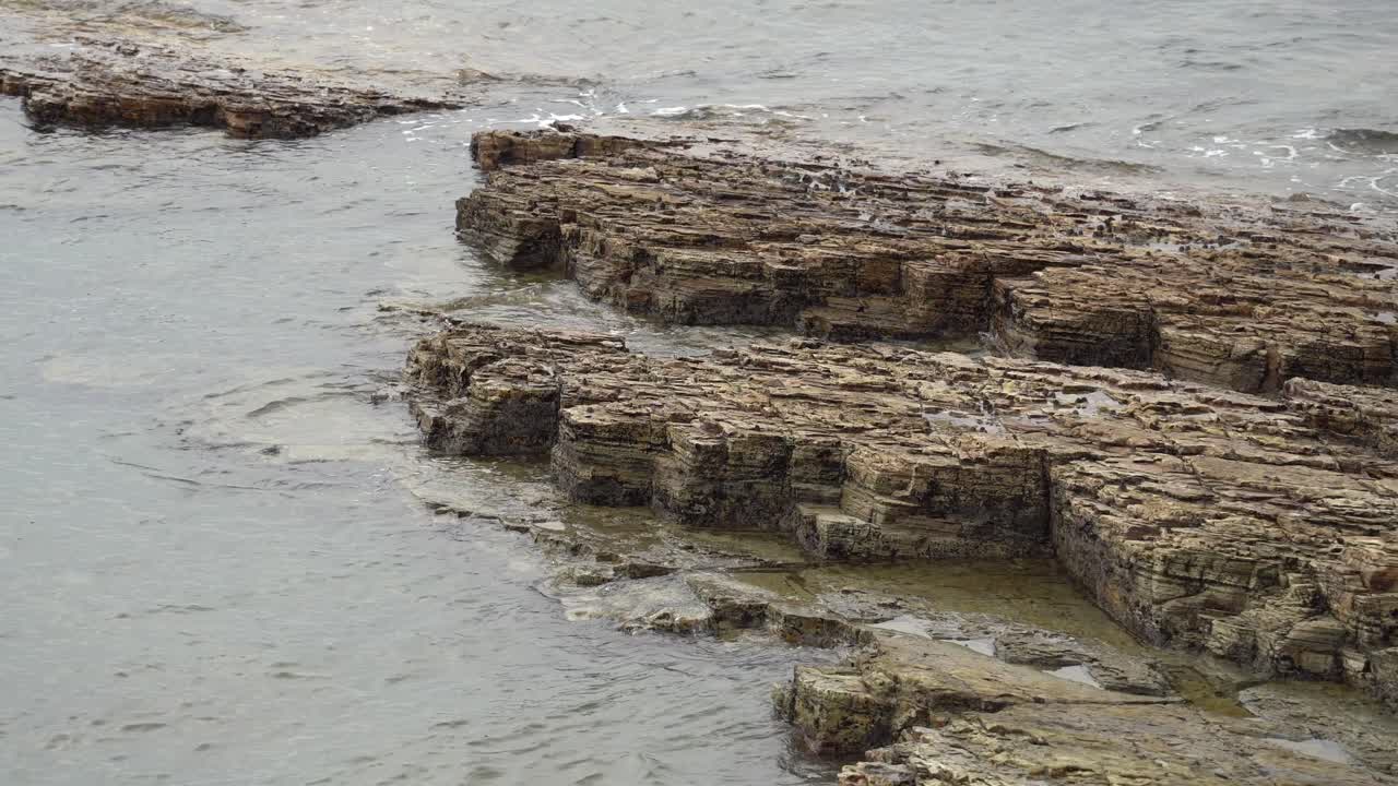 The Coastal Rocks Being Blown by Tidal Waves in Mikawa Bay