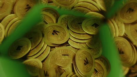 symmetrical video footage of ancient chinese gold coins - close up