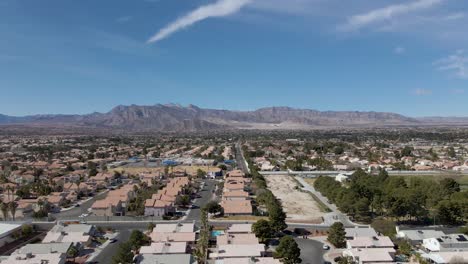 Organized-houses-next-in-suburbs-living-area-of-Las-Vegas-with-an-amazing-view-on-a-high-mountain-in-the-desert