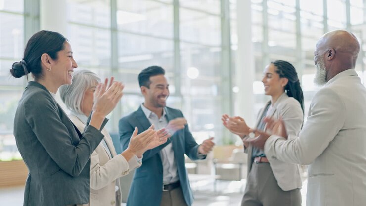 Business people, high five