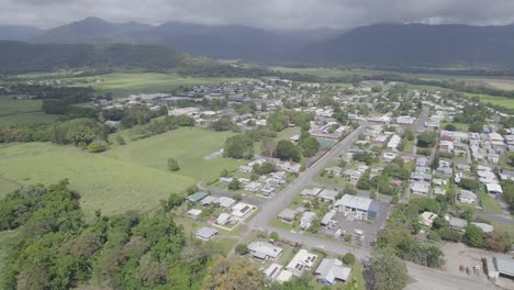 small rural town of mossman on a cloudy day of summer in the shire of douglas, queensland, australia - aerial drone shot