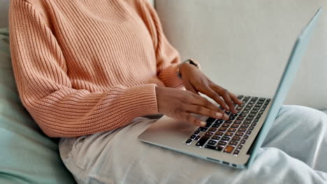 laptop, smartphone and student on sofa