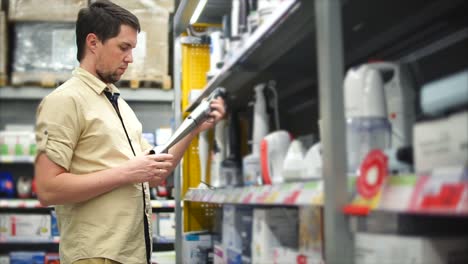 man shopping for appliances in a retail store