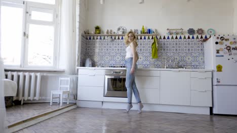 woman standing in a modern kitchen