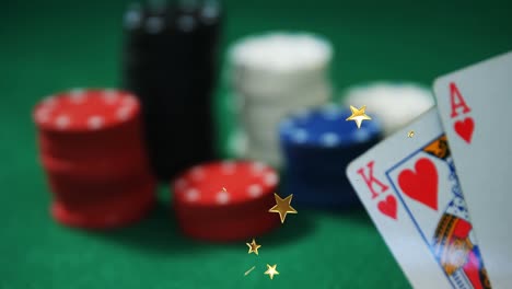 Animation-of-moving-stars-over-poker-chips-and-cards-on-green-board