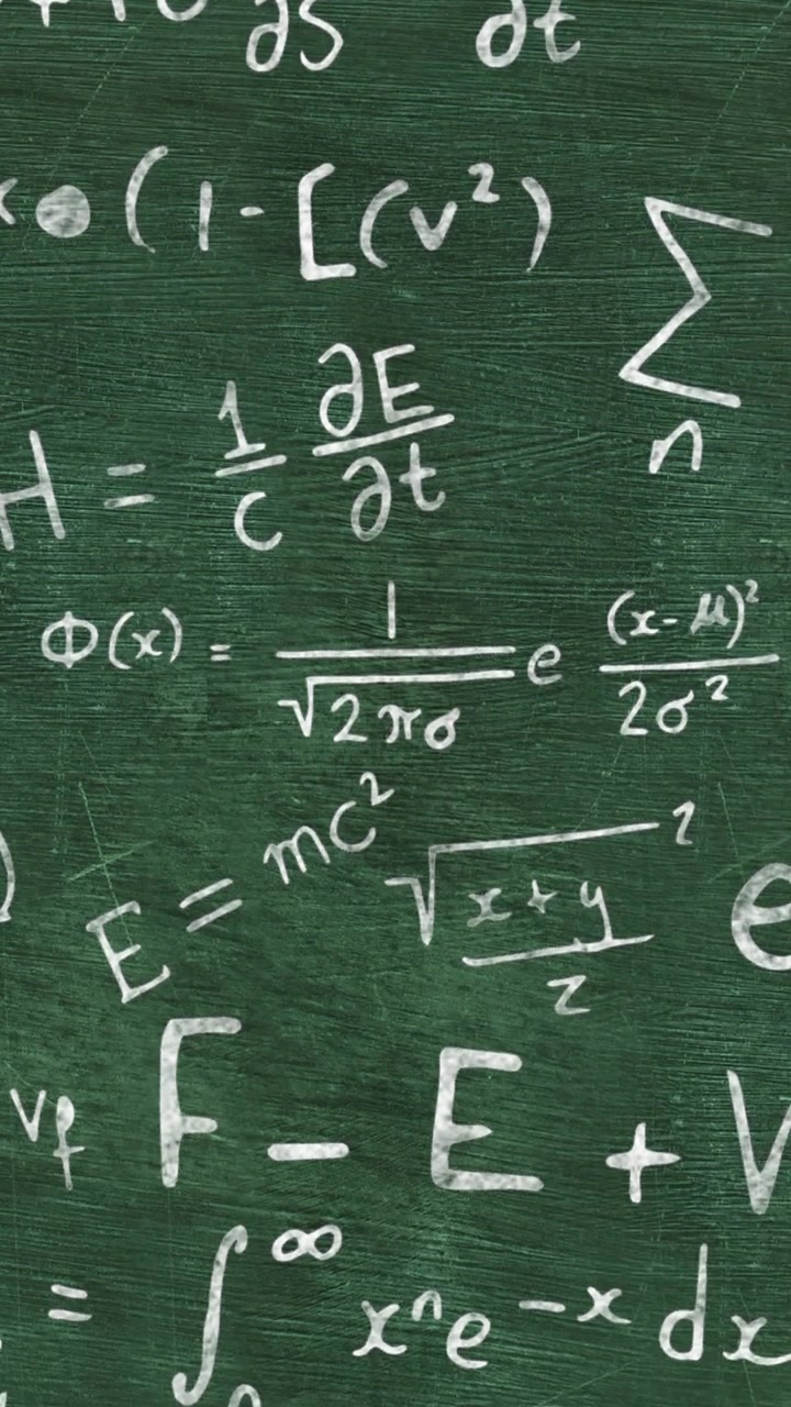 Animation of scrolling maths equations written in chalk on chalkboard