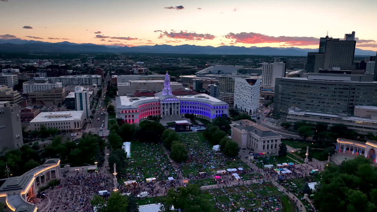 Sunset aerial pullback from 4th of July celebrations at Denver Civic Center Park