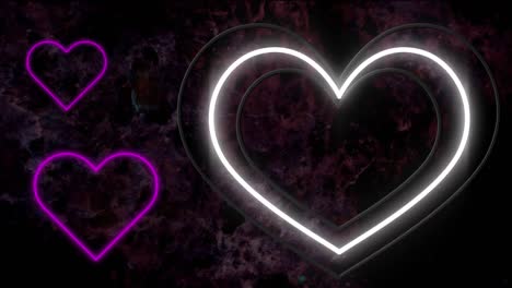 animation of pink and yellow neon hearts flashing on dark brick wall