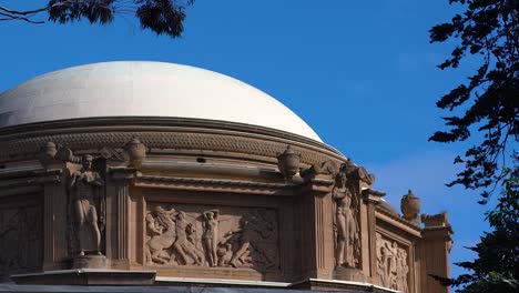 statues and carvings on the palace of fine arts dome on a sunny day in san francisco