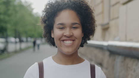 smiling young woman outdoors