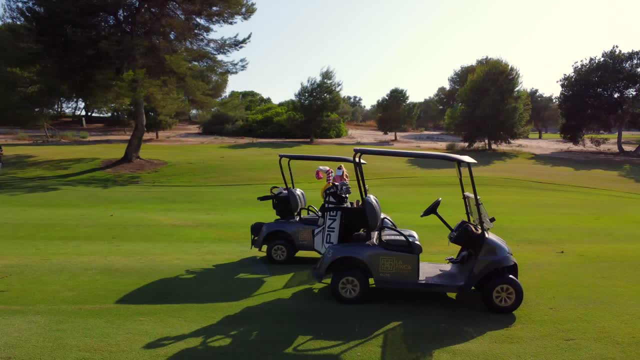 Golfing on a sunny day at the golf course