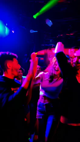 nightclub party with vibrant lights and dancing people