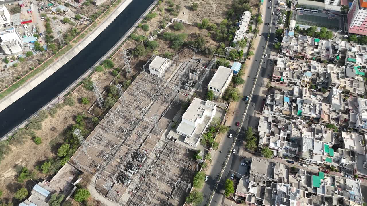 Aerial view of a busy Jaipur city intersection during peak traffic hours