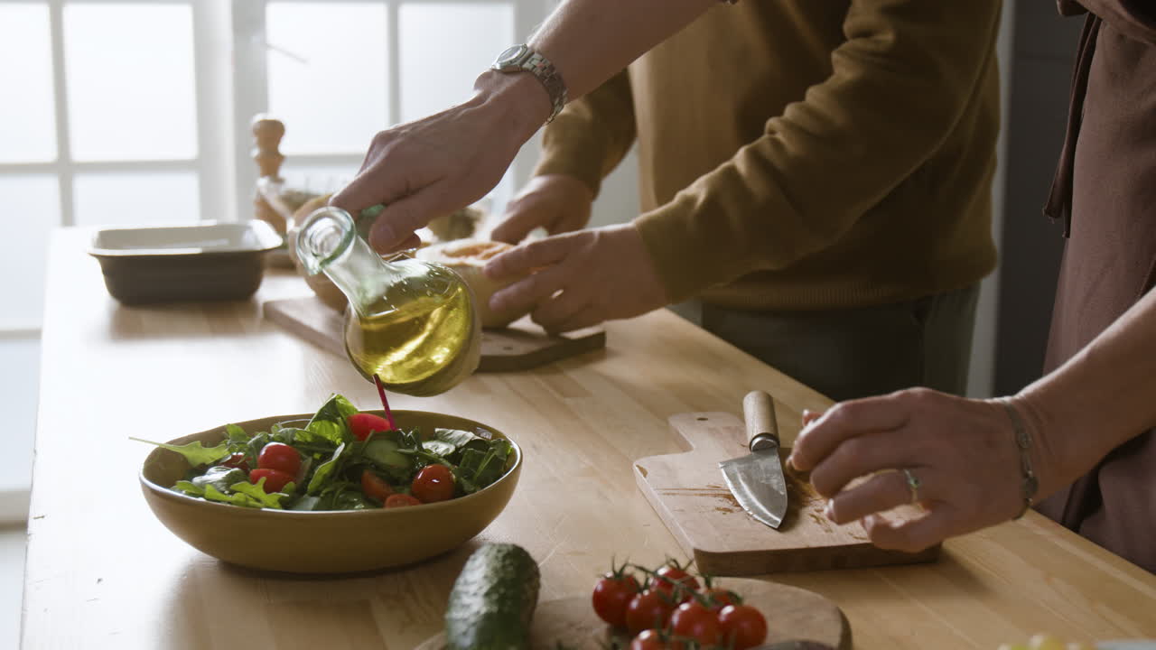 Preparing a Fresh Salad with Olive Oil