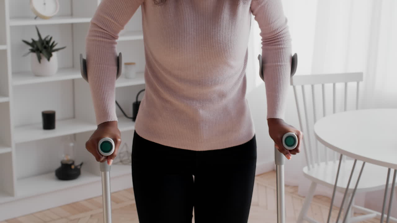 Woman Using Crutches