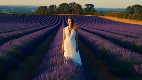 woman in white dress in lavender field