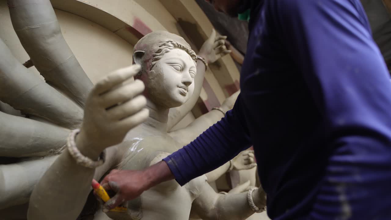 In Kumortuli, idol artists are making idols of Durga, the revered deity of Hinduism. The work of making these idols starts from June and these potters make many idols till November.