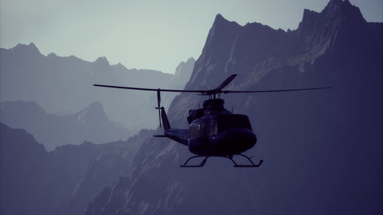 Helicopter flying over mountain landscape during sunrise in remote area
