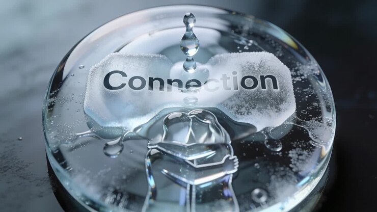 Thin stream dropping droplets, striking disc on dark table, revealing Connection and hugging relief