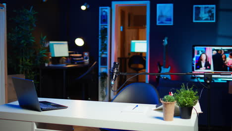 panning shot of empty home studio with content creation gear tech