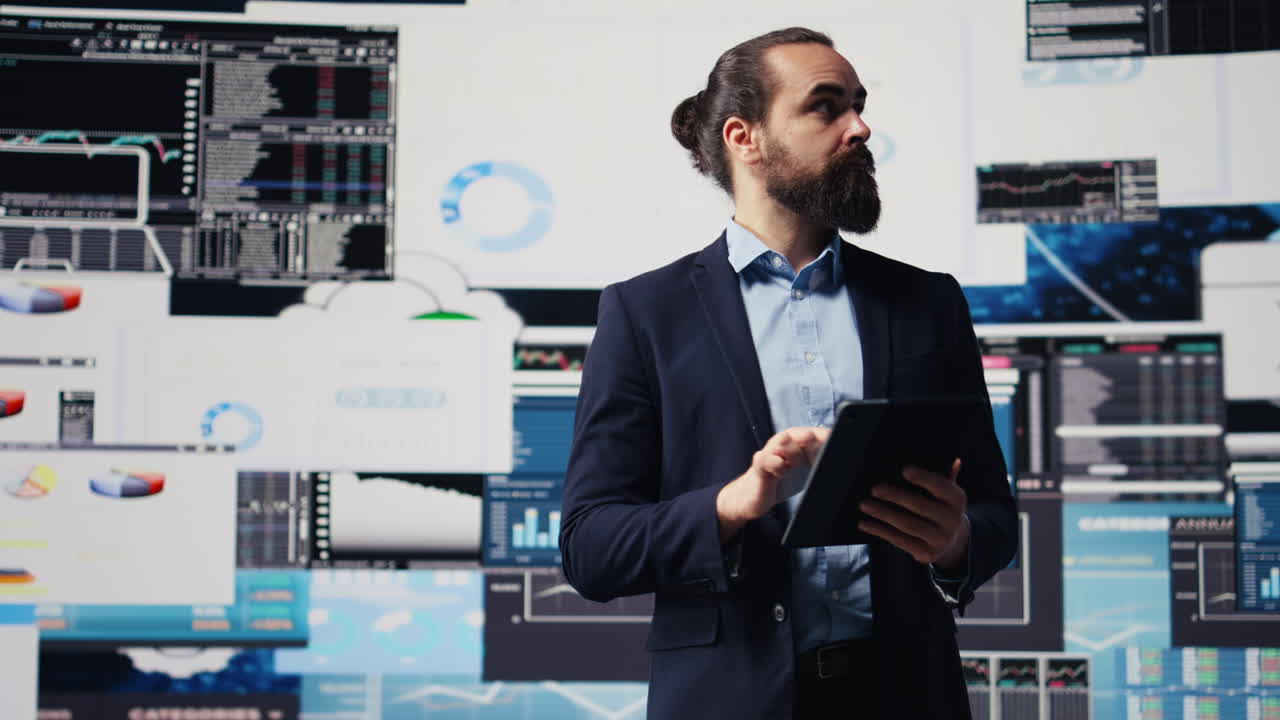 Business expert reflecting on monthly performance metrics on dashboards