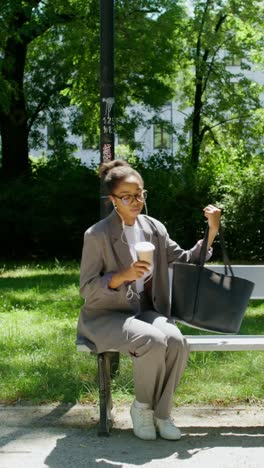 business woman relaxing in a park