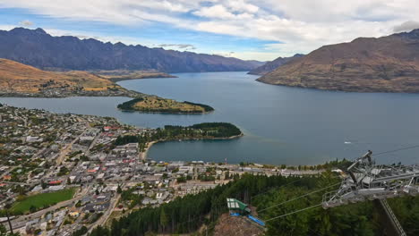 establishing aerial panning view of coastal city, queensland, new zealand