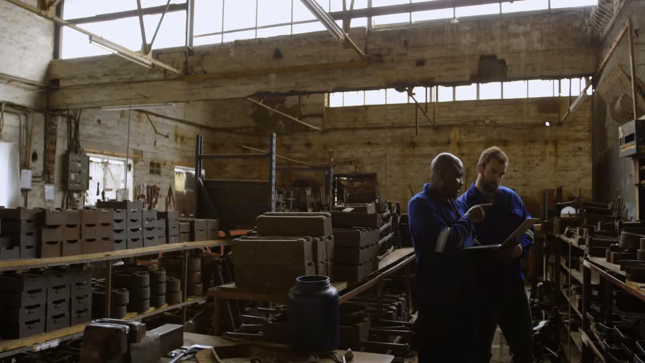 Metalsmiths maintaining stocks on laptop 4k