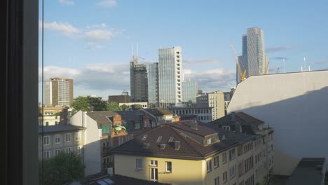 residential buildings and high-rise office towers from neighboring window