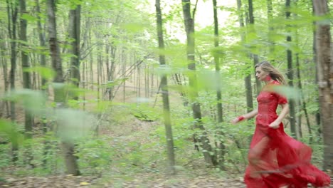 girl running in summer forest