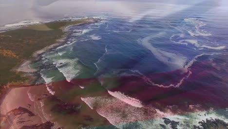 digital composition of waving russia flag against aerial view of waves in the sea