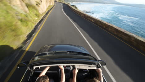 couple driving convertible car cabriolet cape town south africa steadicam shot