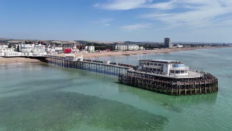 low panning drone aerial pier worthing west sussex uk