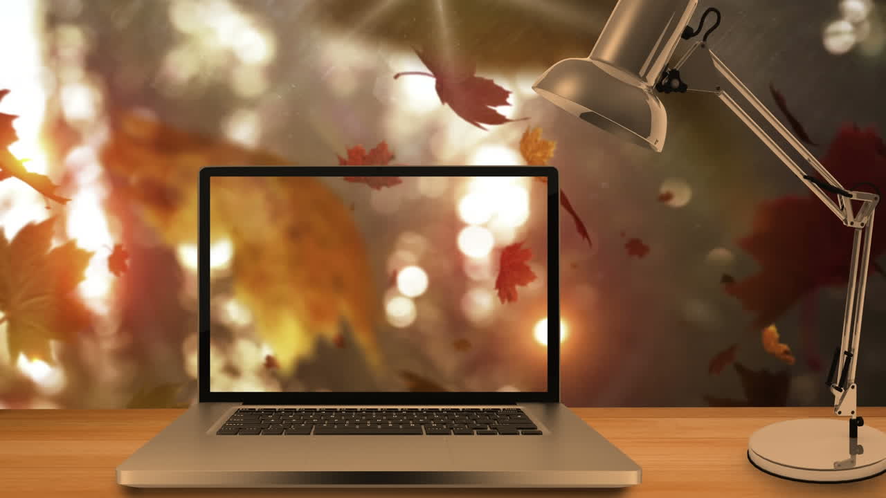 hojas de otoño cayendo contra la computadora portátil 4k