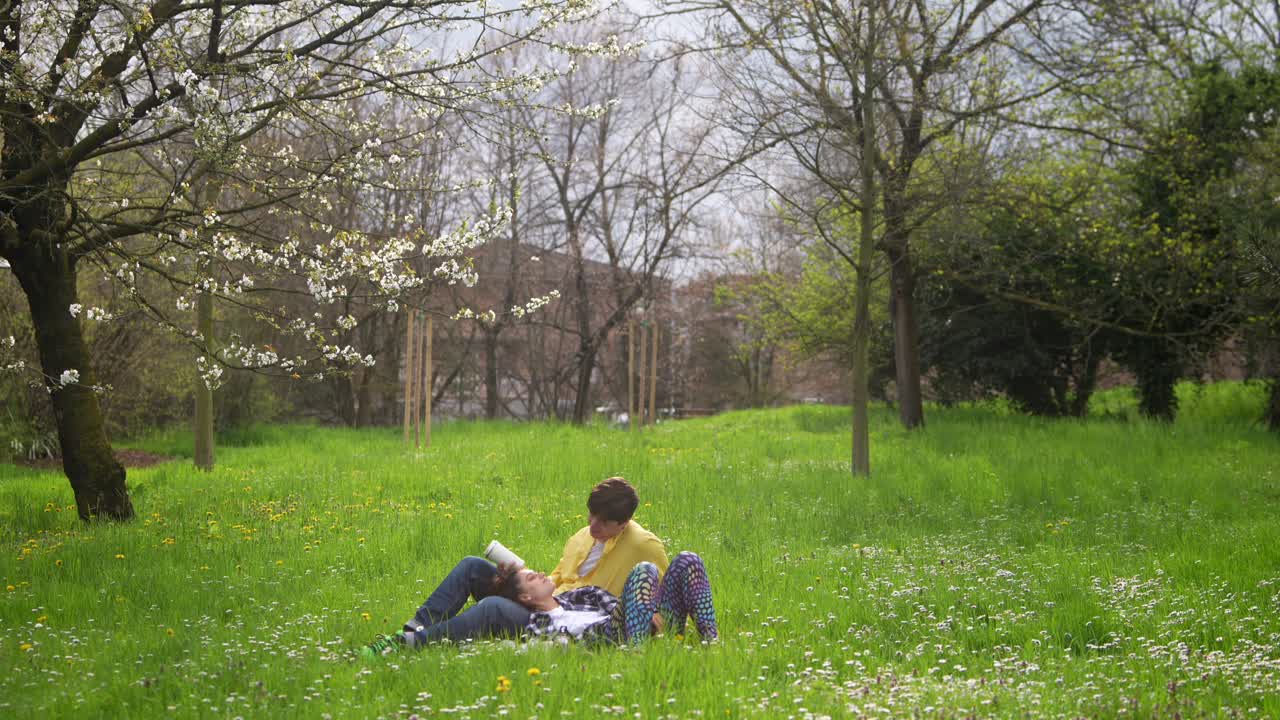 Couple Relaxing in a Spring Park