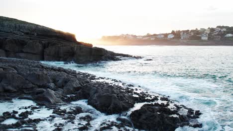 sunset over the rocky coast