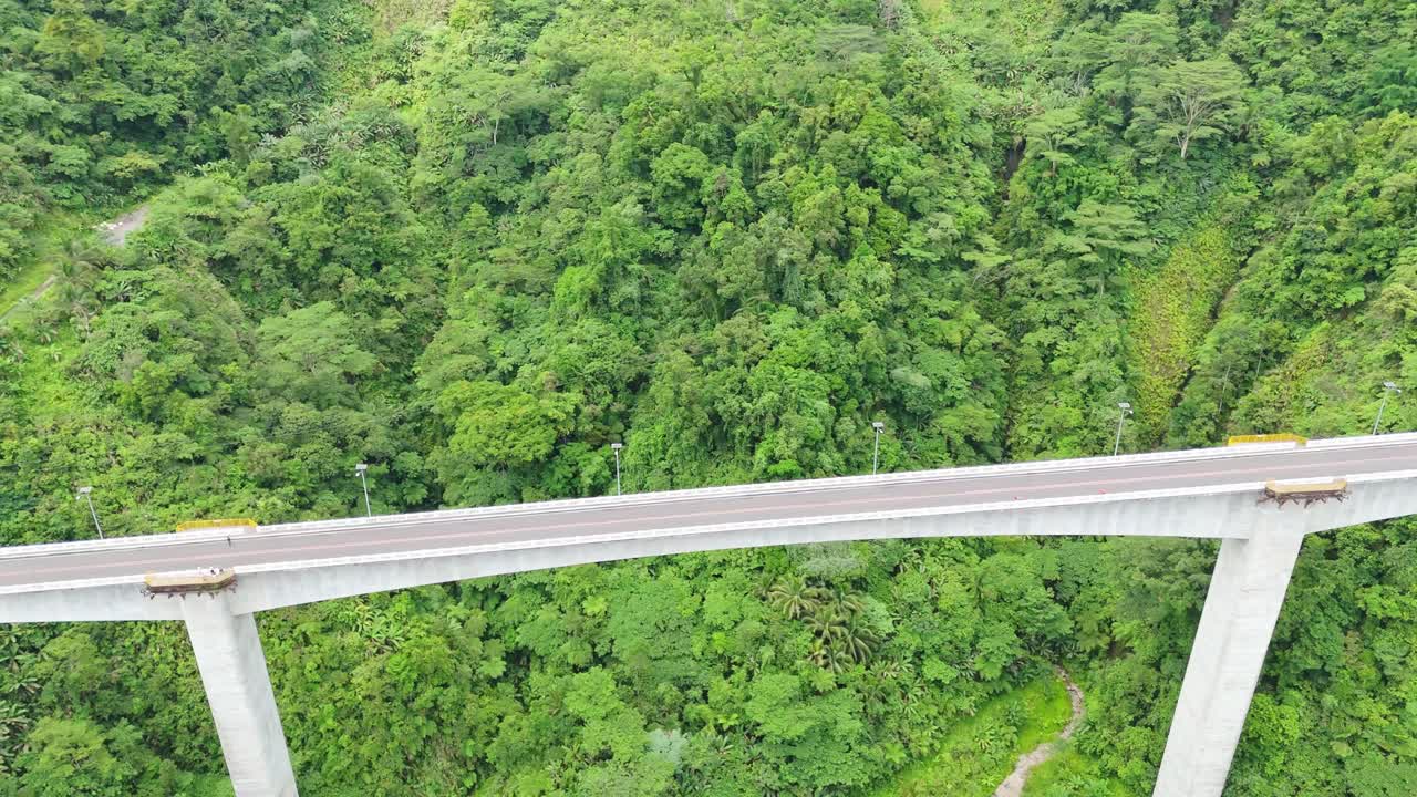 Aerial View of Agas-Agas Concrete Bridge Crossing Mountainous Gorge on Pan-Philippine Highway