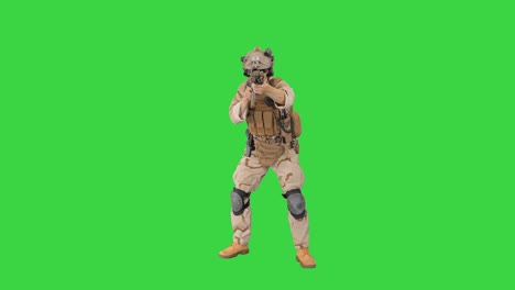 soldier moving from side to side aiming with the rifle on a green screen, chroma key