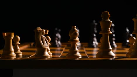 cinematic shot of white and black chess pieces on a chessboard